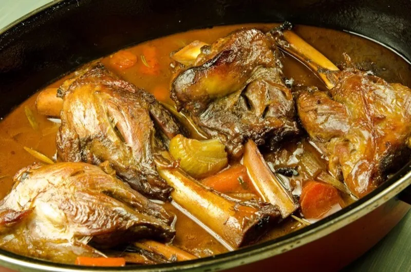Slow-braised lamb shank with carrots
